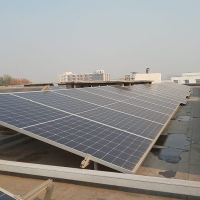 Solar panels installed on the roof of Millat Tractor facility by Renergent Energy