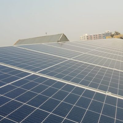 Solar panels installed on the roof of Millat Tractor facility by Renergent Energy
