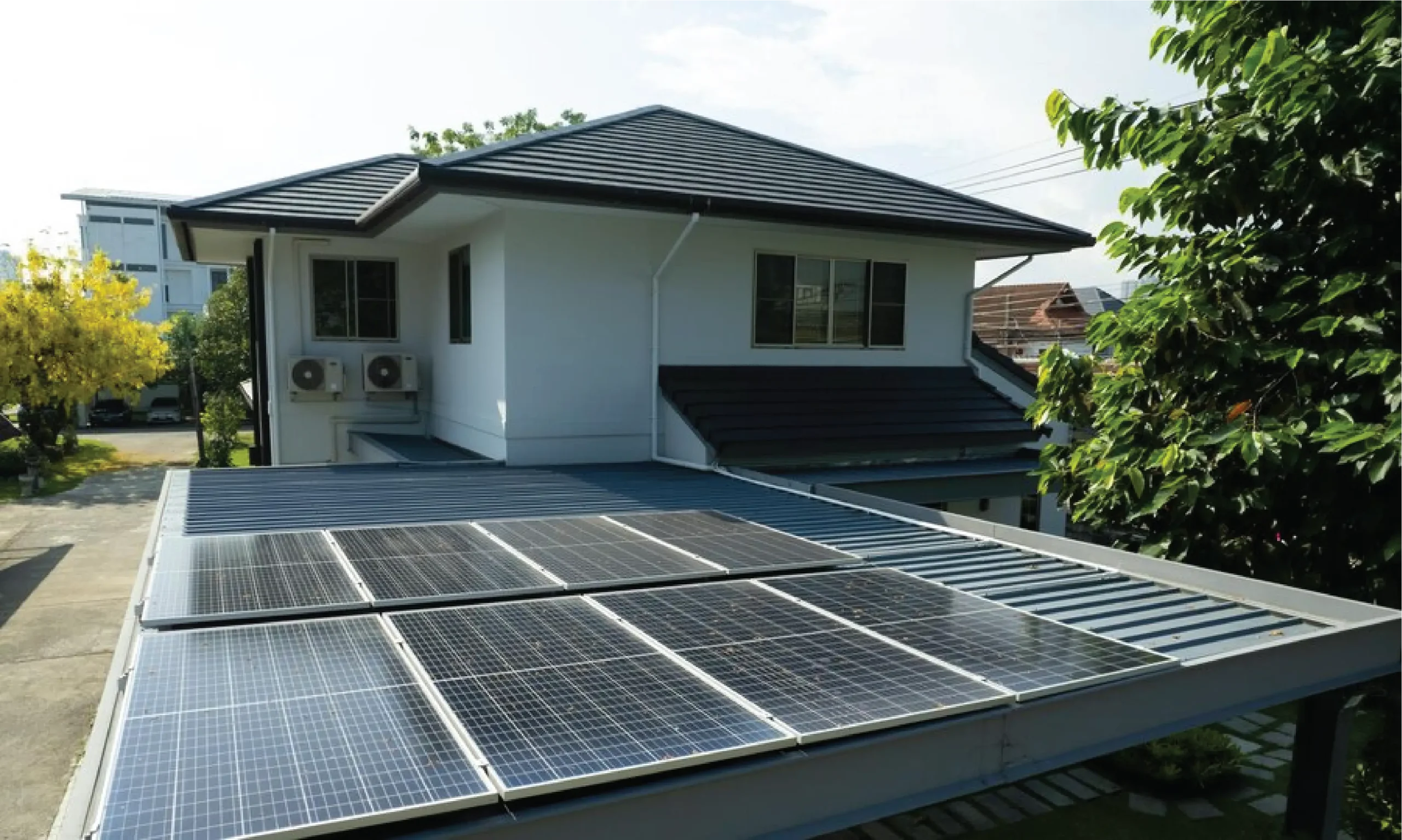 A photo of a residential solar system installed on a rooftop.